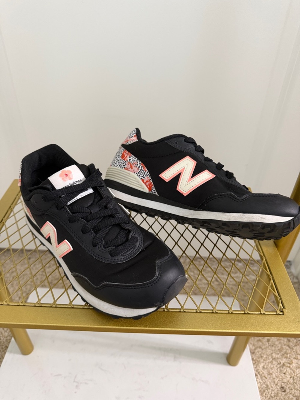 New Balance Black Sneakers with Pink Accents and Floral Detail